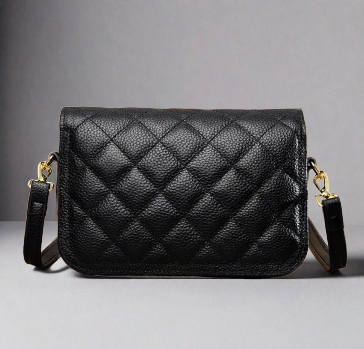 Quilted black shoulder bag back