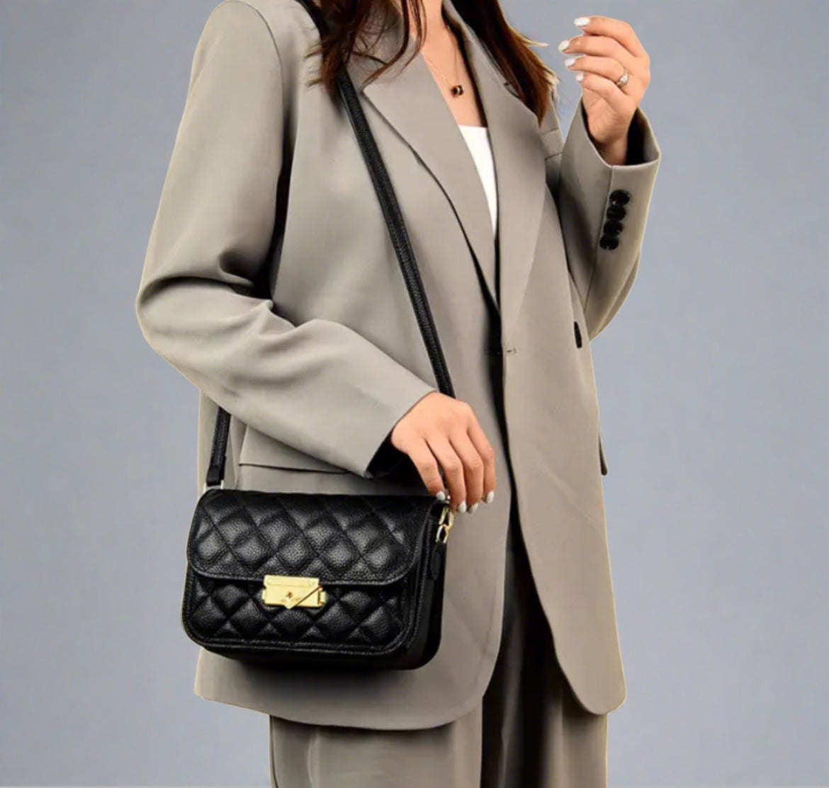 Quilted black shoulder bag