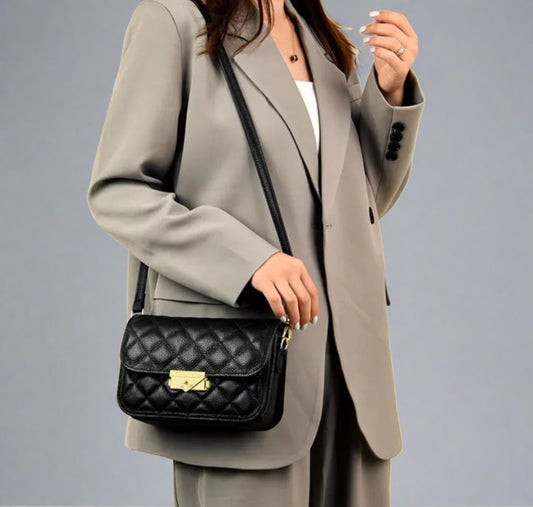 Quilted black shoulder bag